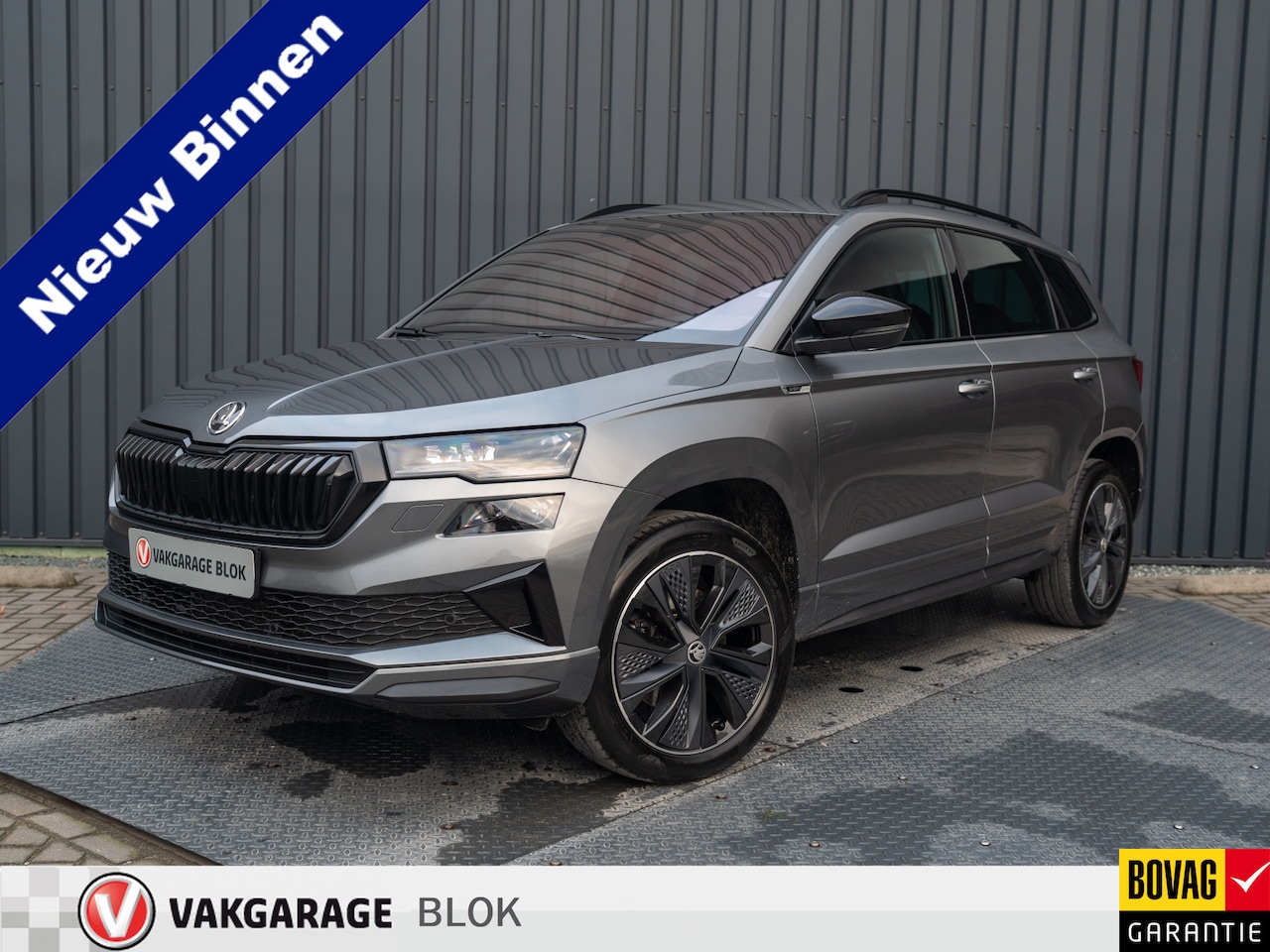 Skoda Karoq - 1.5 TSI ACT Sportline Business | Elk. A-klep | Camera | Lane Assist | Stoel & Stuur verw. - AutoWereld.nl