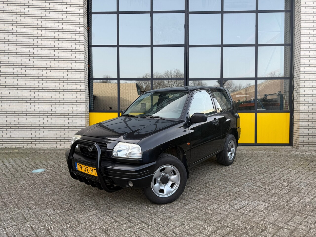 Suzuki Grand Vitara - 2.0 Metal Top 2.0 Metal Top, Airco, Trekhaak - AutoWereld.nl