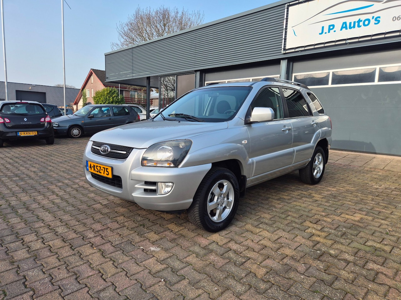 Kia Sportage - 2.0 CVVT Comfort AIRCO - AutoWereld.nl