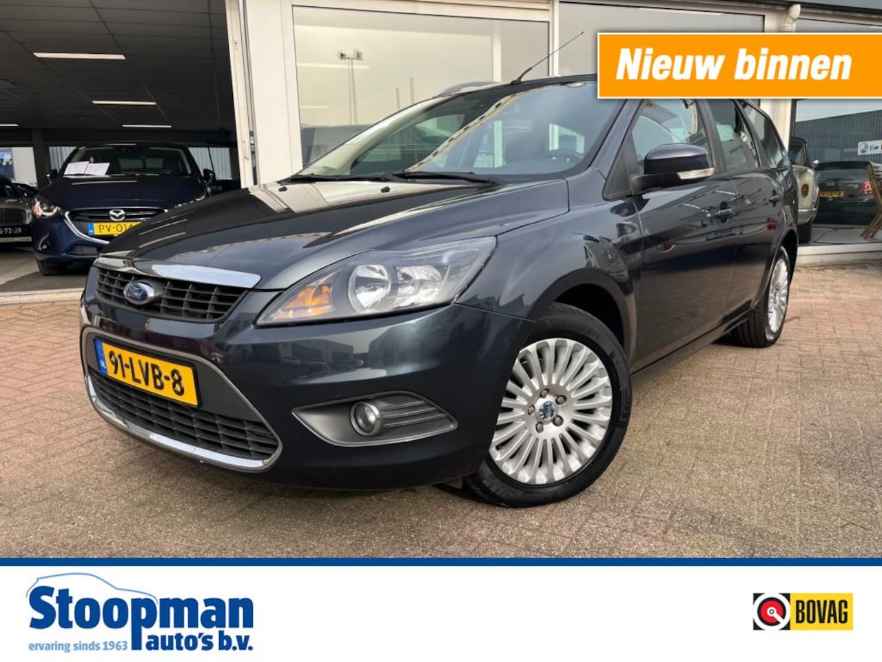 Ford Focus Wagon - 1.6 Limited Wagon Clima Cruise Bluetooth - AutoWereld.nl
