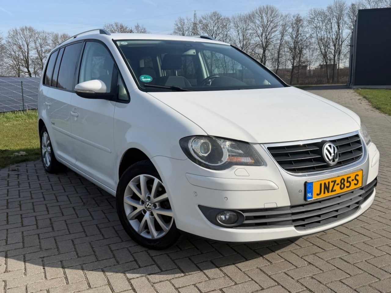 Volkswagen Touran - 1.4 TSI FREESTYLE 140pk XENON/  NAVIGATIE / PDC V+A / STOELV - AutoWereld.nl