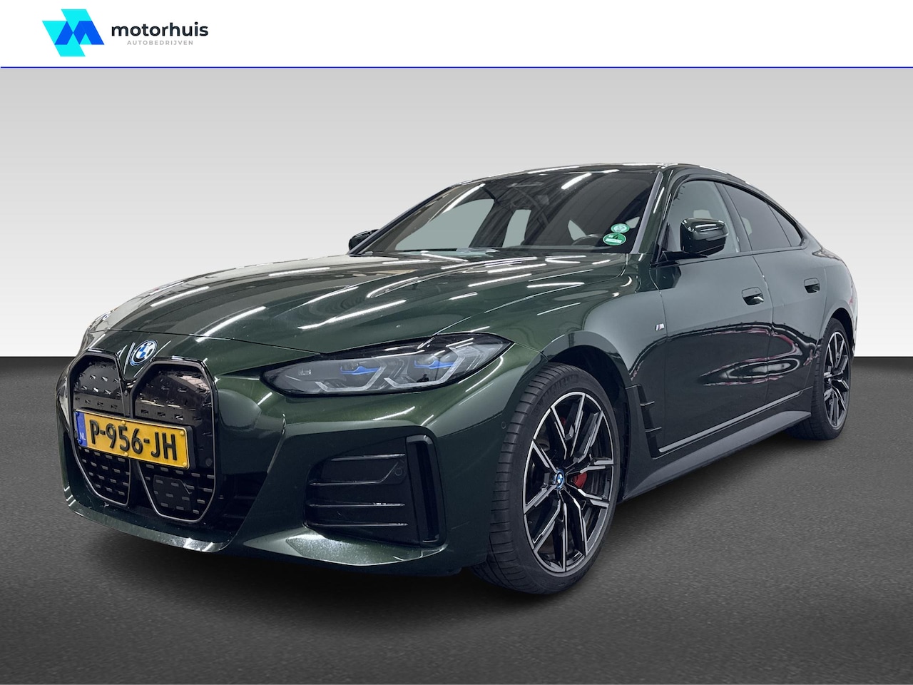 BMW i4 - eDrive40 High Executive 84 kWh | Achteruitrijcamera | Cruise control adaptief met Stop&Go - AutoWereld.nl