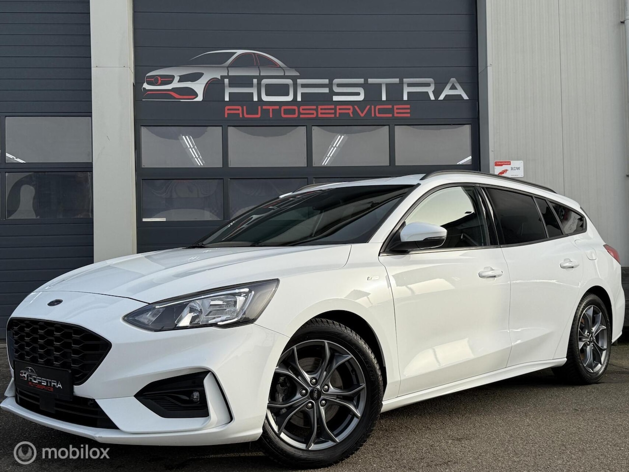 Ford Focus Wagon - 1.0 EcoBoost Hybrid ST Line X Winterpack Camera CarPlay DAB - AutoWereld.nl