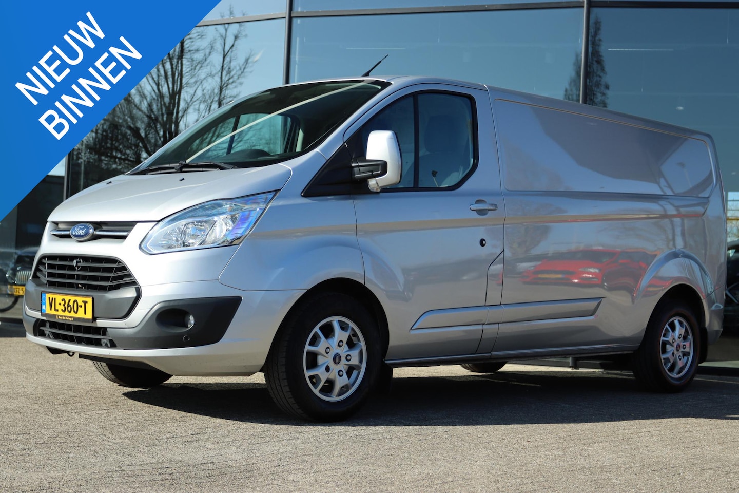 Ford Transit Custom - 290 2.2 TDCI L2H1 LIMITED | TREKHAAK | PDC | CRUISE | AIRCO | 3-ZITS - AutoWereld.nl