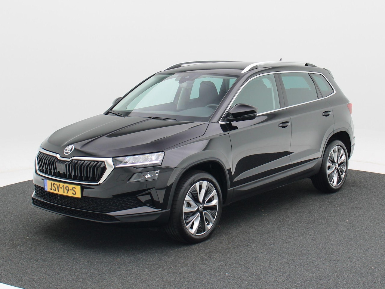 Skoda Karoq - 1.5 TSi 150 Pk Automaat Business Edition | Adaptive Cruise | Climate Control | Stoelverwar - AutoWereld.nl
