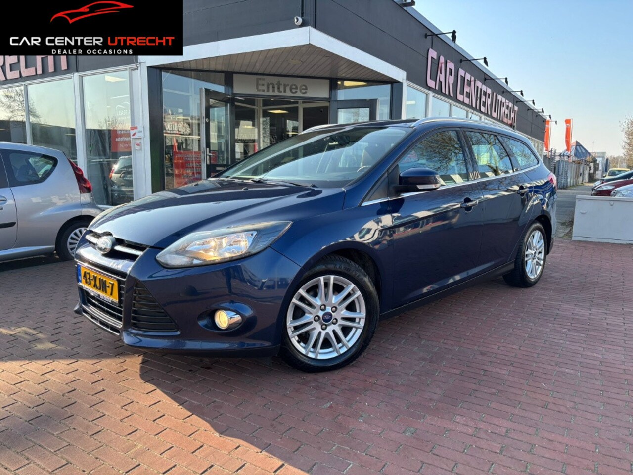 Ford Focus Wagon - 1.0 EcoBoost Titanium 6versn airco navi nette auto - AutoWereld.nl