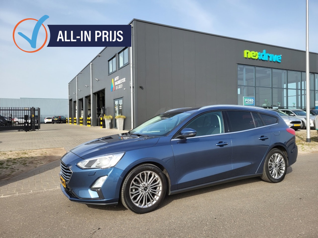Ford Focus Wagon - 1.0 Ecoboost 125 pk Titanium Bussines Adap. Cruise / 17'' / Wint - AutoWereld.nl