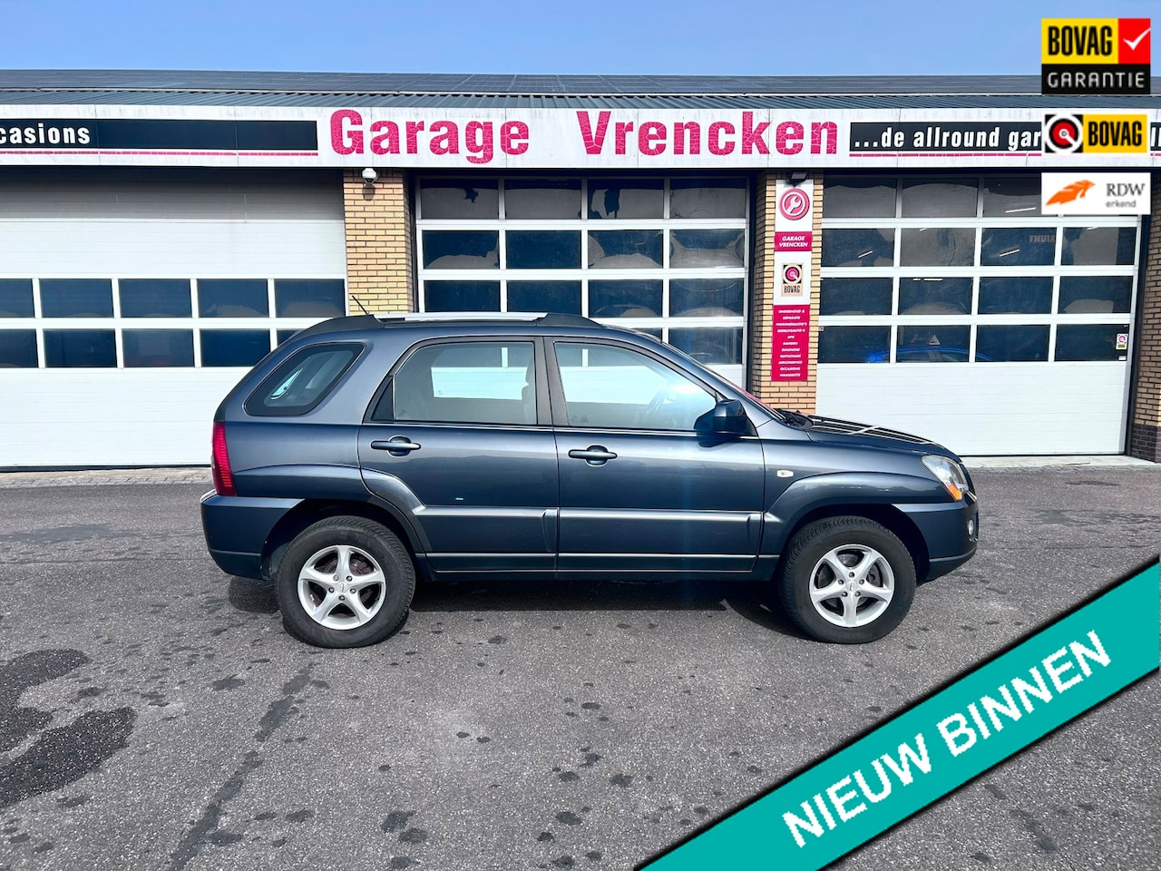 Kia Sportage - 2.0 CVVT X-tra AIRCO TREKHAAK - AutoWereld.nl