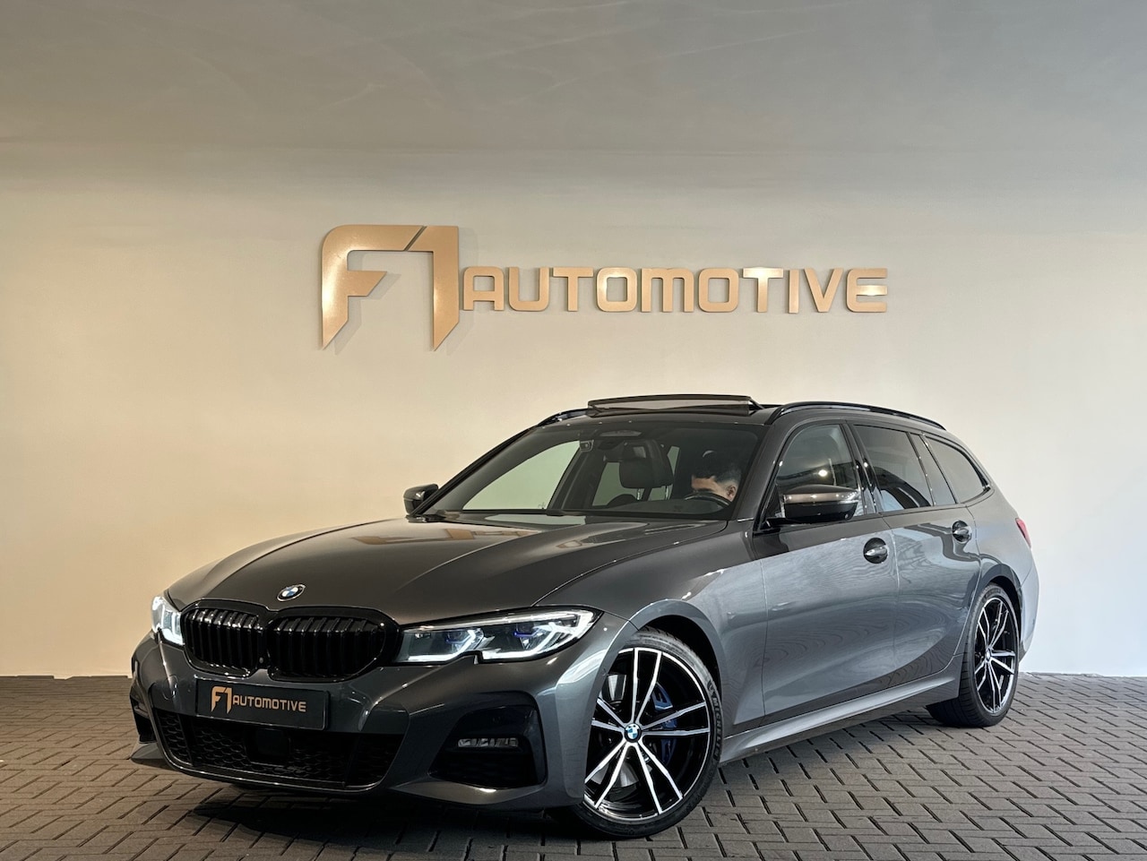 BMW 3-serie Touring - 330i High Executive Pano|HuD|H/K|Memory - AutoWereld.nl