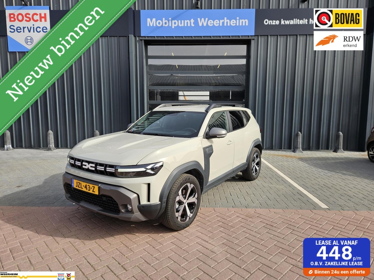 Dacia Duster - 1.6 Hybrid 140 Journey Trekhaak Winterpack + - AutoWereld.nl