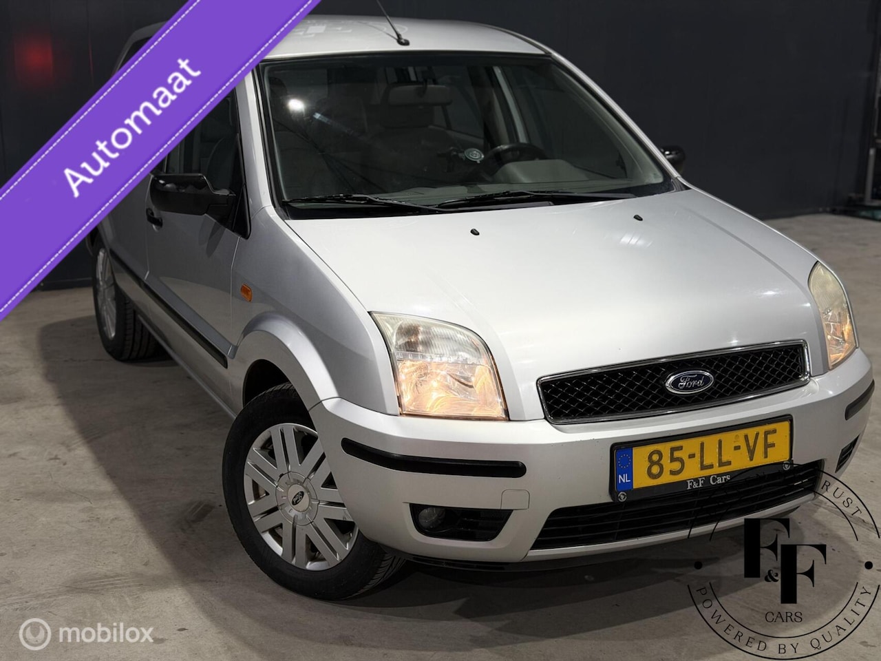 Ford Fusion - 1.4 |80pk|Automaat|128000 km NAP|Airco|Trekhaak - AutoWereld.nl