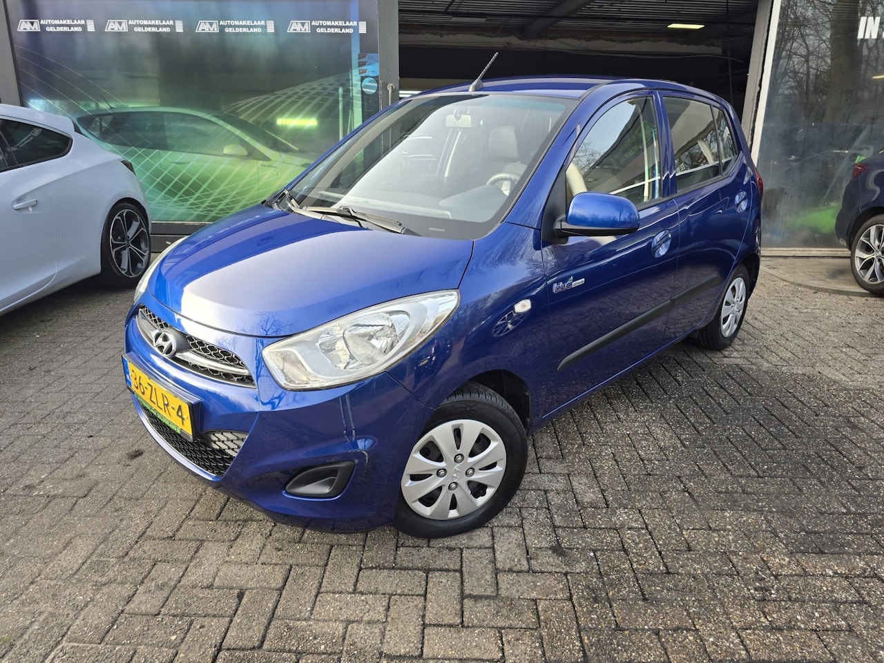 Hyundai i10 - 1.0 i-Drive Cool | 1E EIGENAAR | 12MND GARANTIE | LAGE KM | AIRCO | ELEC RAMEN | - AutoWereld.nl