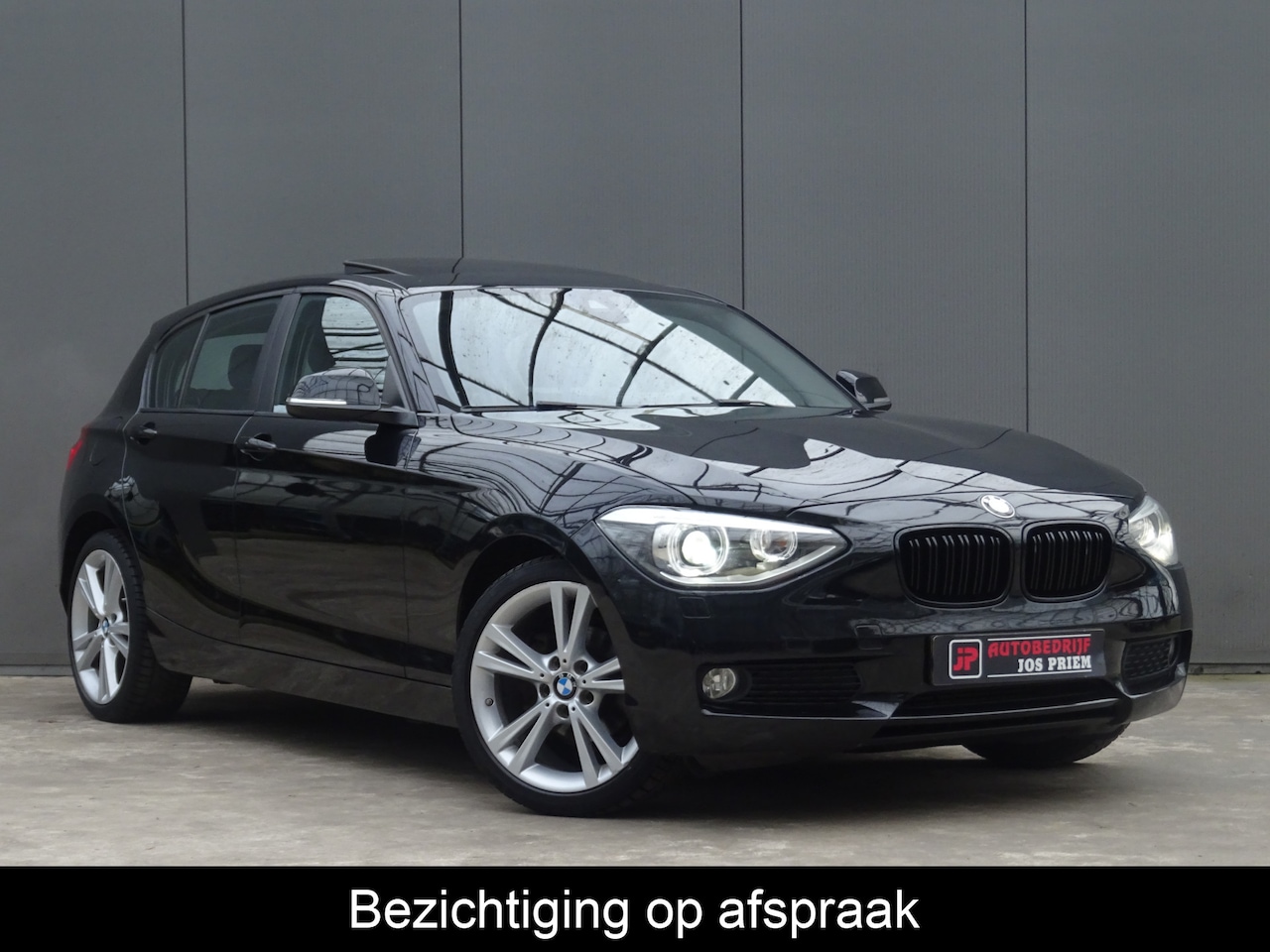 BMW 1-serie - 116i Limited Edition * OPEN DAK * PDC * GR NAVIATIE !! - AutoWereld.nl