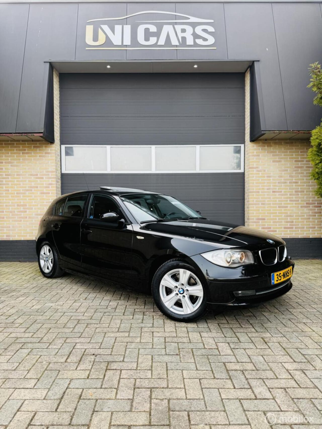 BMW 1-serie - 118i Executive|Automaat|Opendak|Navi|Xenon|LM 16 - AutoWereld.nl