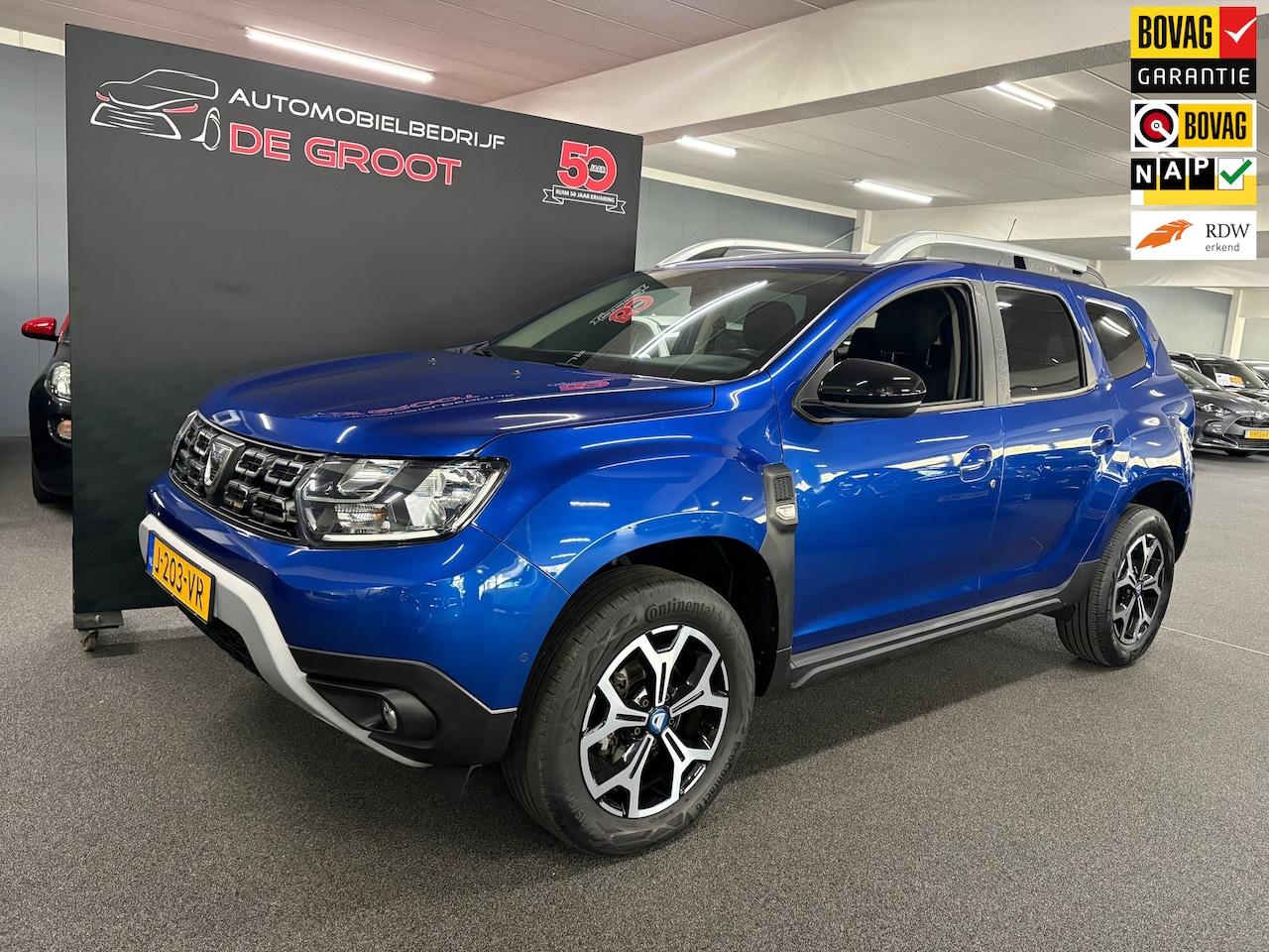 Dacia Duster - 1.3 TCe Serie Limitee 15th Anniversary/ Nederlandse auto/ Achteruitrijcamera/ Parkeersenso - AutoWereld.nl