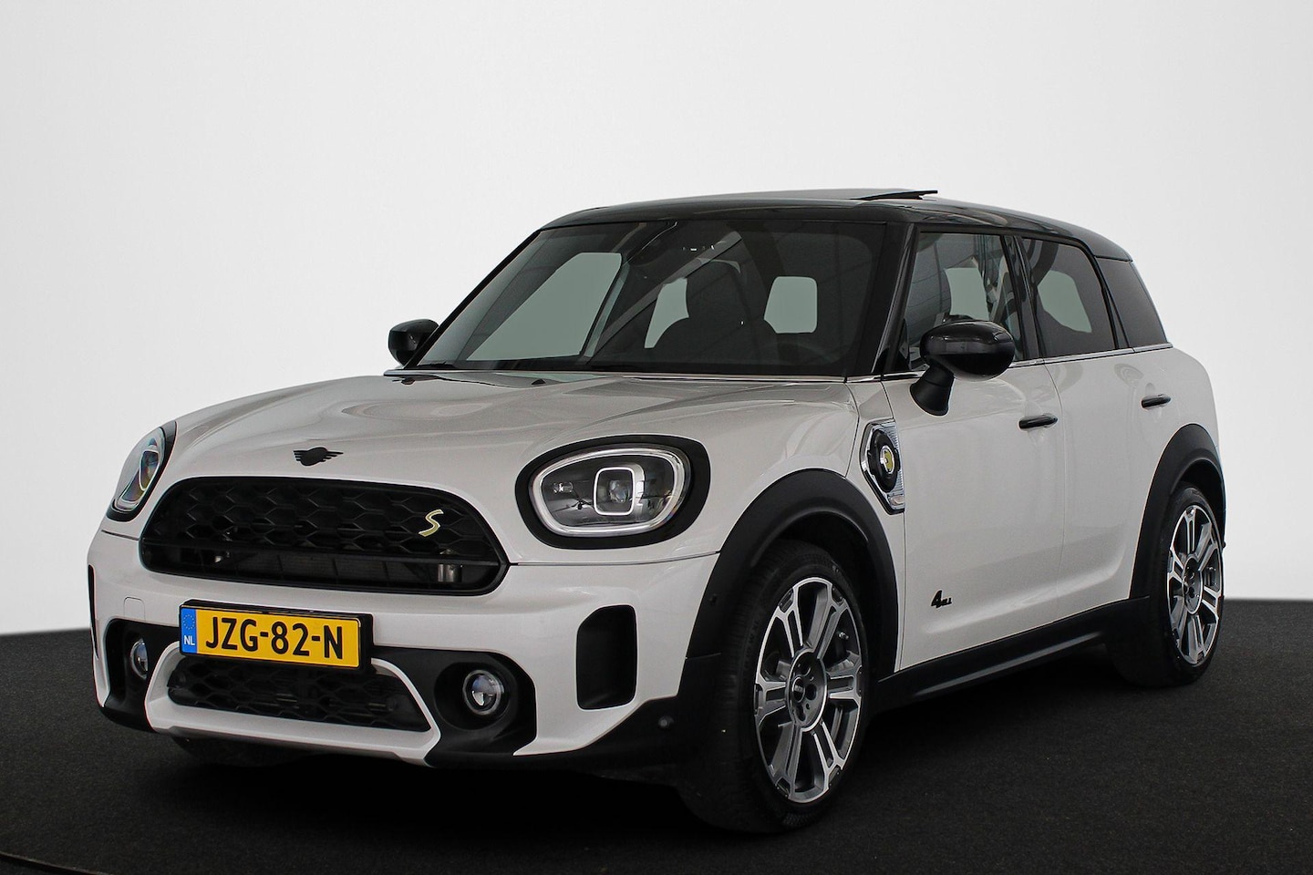 MINI Countryman - Mini 1.5 Cooper S E ALL4 Classic Panoramadak Harman Kardon Keyless - AutoWereld.nl
