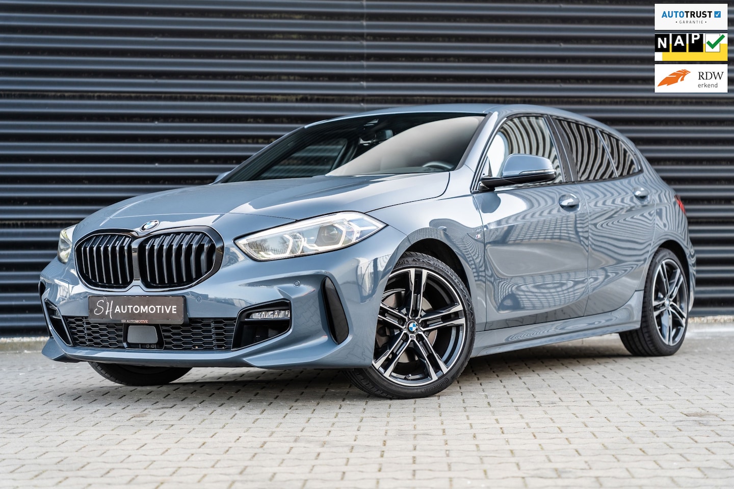 BMW 1-serie - 118i Executive M Sport / CARPLAY / STOELVERWARMING / STORM BAY - AutoWereld.nl