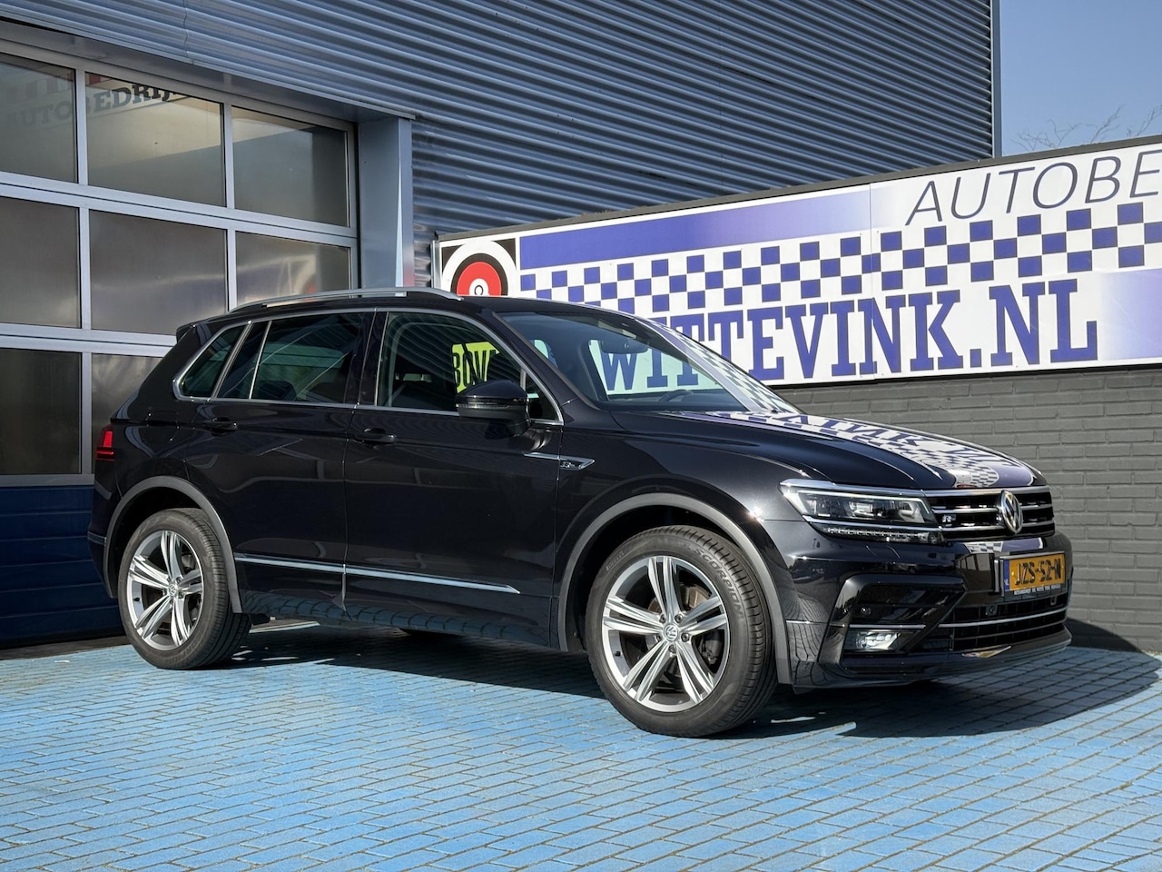 Volkswagen Tiguan - 1.4 TSI R-LINE ADAP CRUISE TREKH VIRTL. - AutoWereld.nl