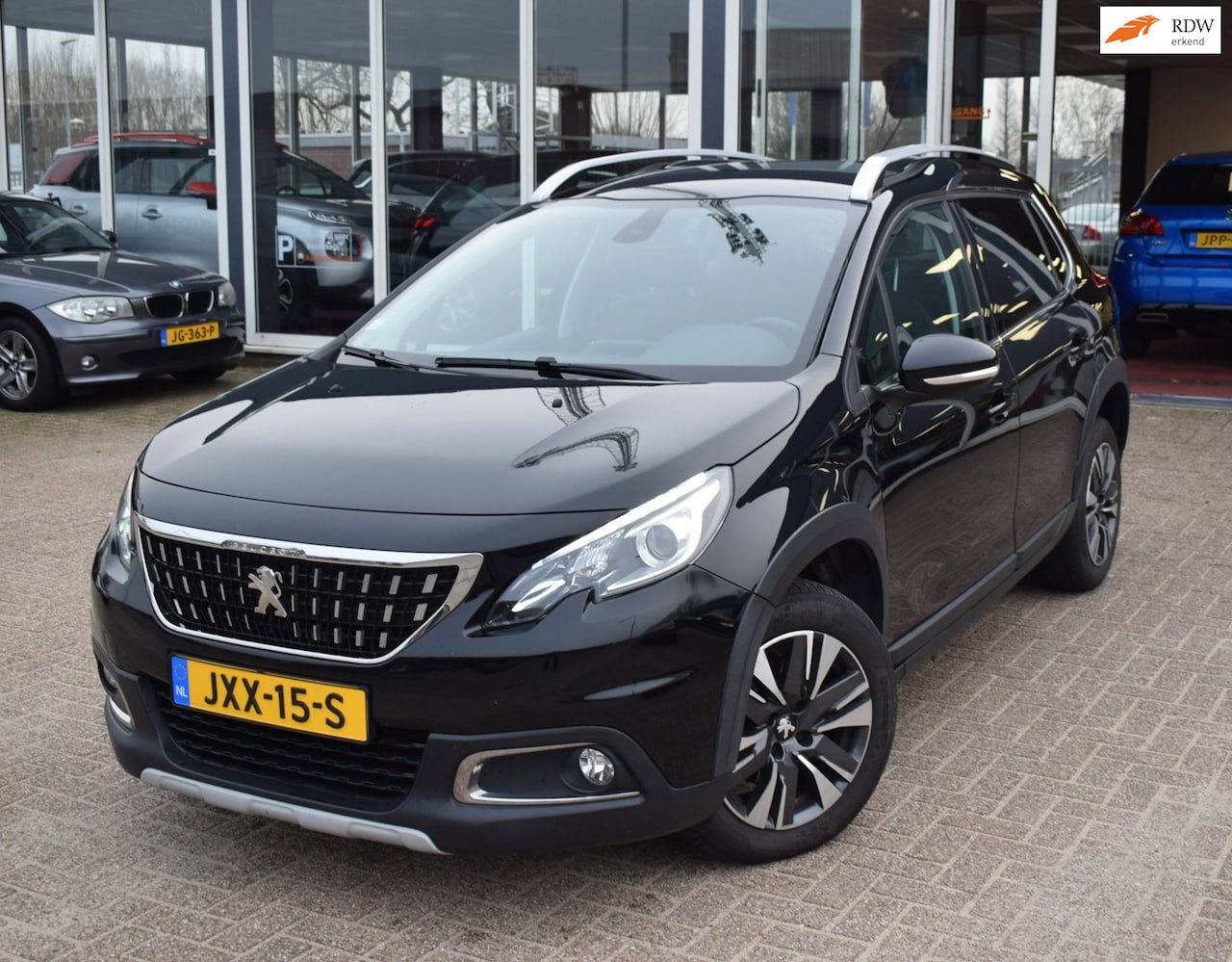 Peugeot 2008 - 1.2 PureTech GT-Line | AUTOMAAT | NAVIGATIE | HALF LEDER | CLIMATE CONTROL | CRUISE CONTRO - AutoWereld.nl