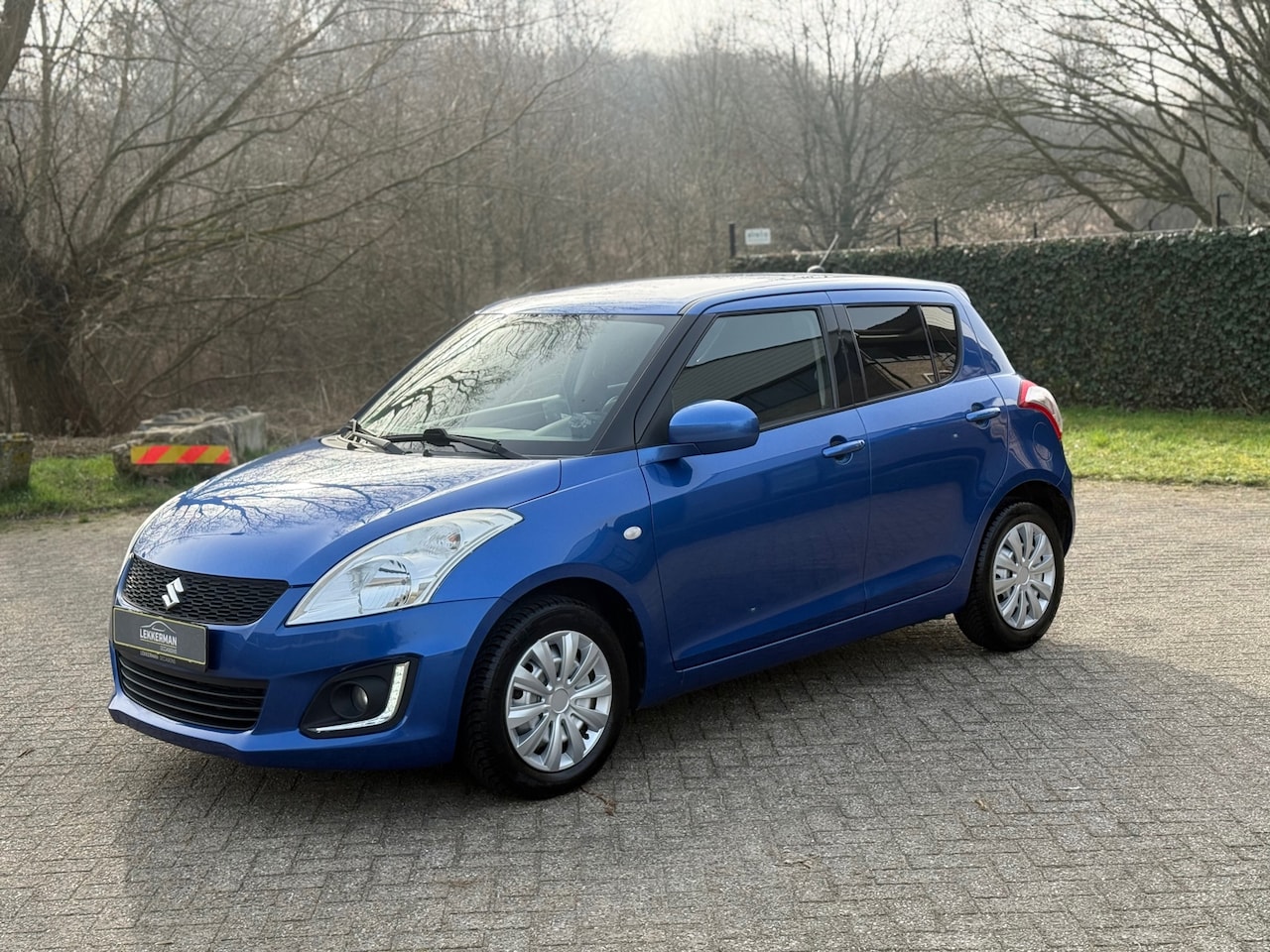 Suzuki Swift - 1.2 Dynamic EASSS CRUISE I CAMERA I NWE APK I ZEER NETTE AUTO - AutoWereld.nl