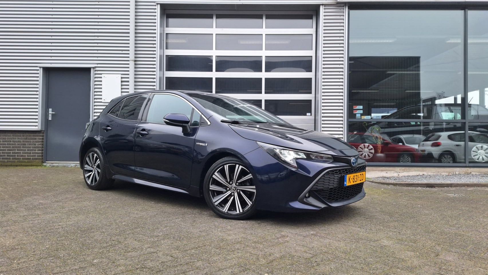 Toyota Corolla - 1.8 Hybrid Business Plus/Camera/Cruise/Lm velgen/ - AutoWereld.nl