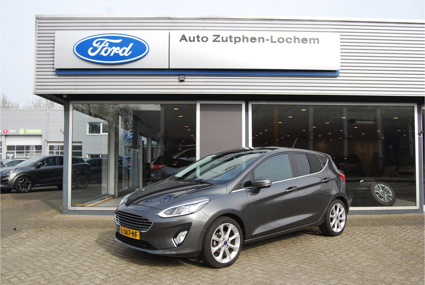 Ford Fiesta - Titanium 5dr 125pk | NAVI | CAMERA | STOEL + VOORRUITVERWARMING | CRUISE CONTROL |  PARK.S - AutoWereld.nl