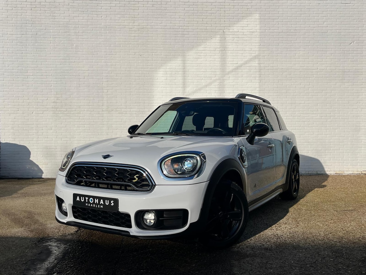MINI Countryman - 1.5 Cooper SE ALL4 Chili - AutoWereld.nl