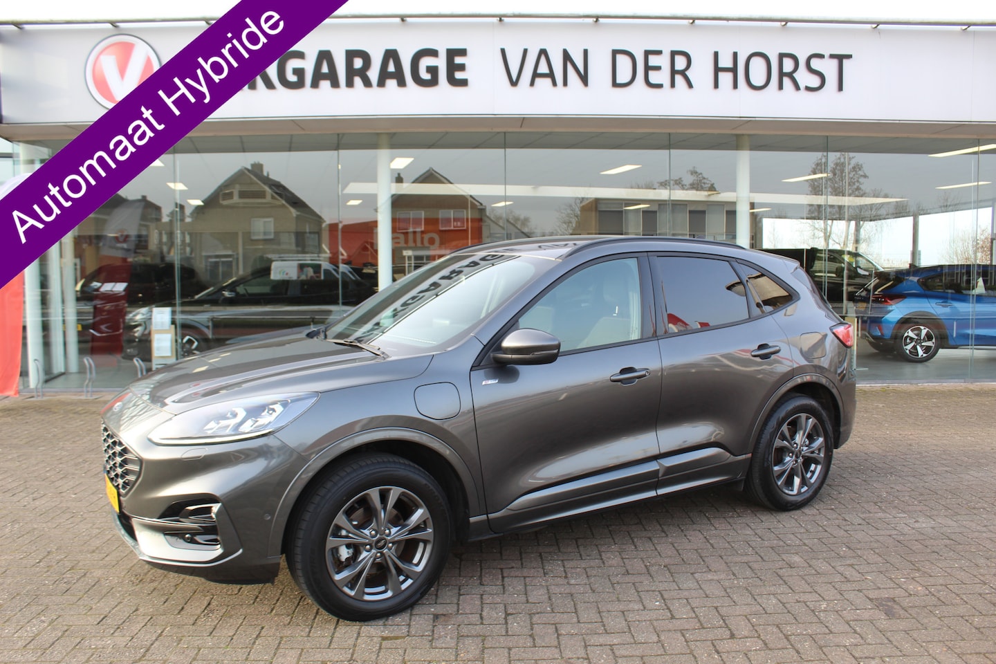 Ford Kuga - 2.5-225pk Plug-in Hybrid ST-Line X. Hybride rijden voor een reële prijs ! Adaptive Cruise - AutoWereld.nl