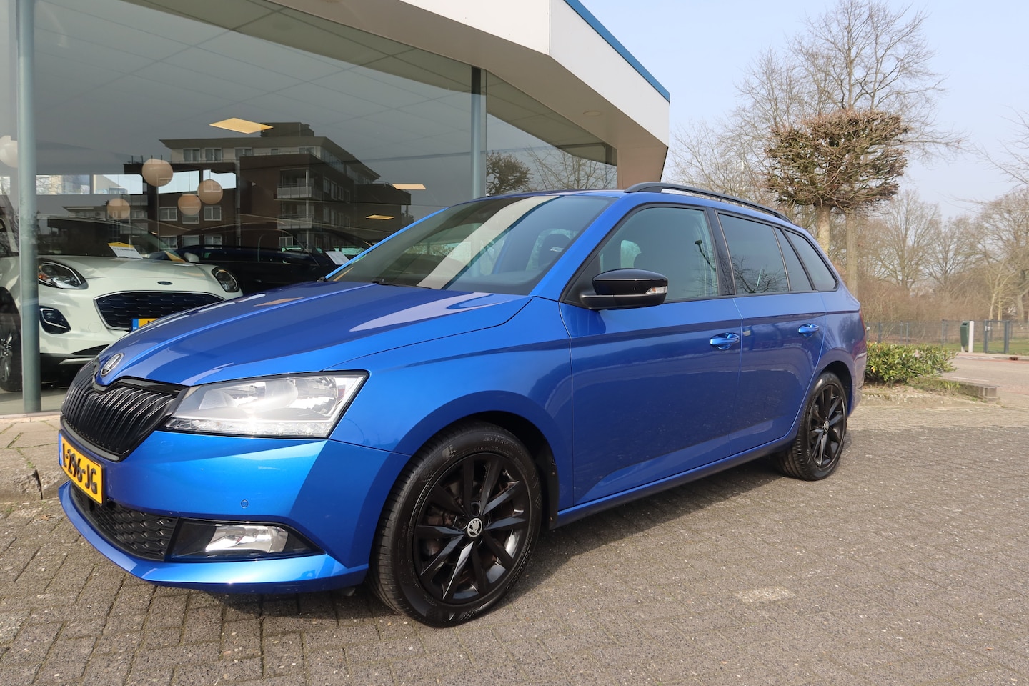 Skoda Fabia Combi - 1.0 TSI Sport Business I NAVI I PARKEERSENSOREN I BLUETOOTH I KEY-LESS - AutoWereld.nl