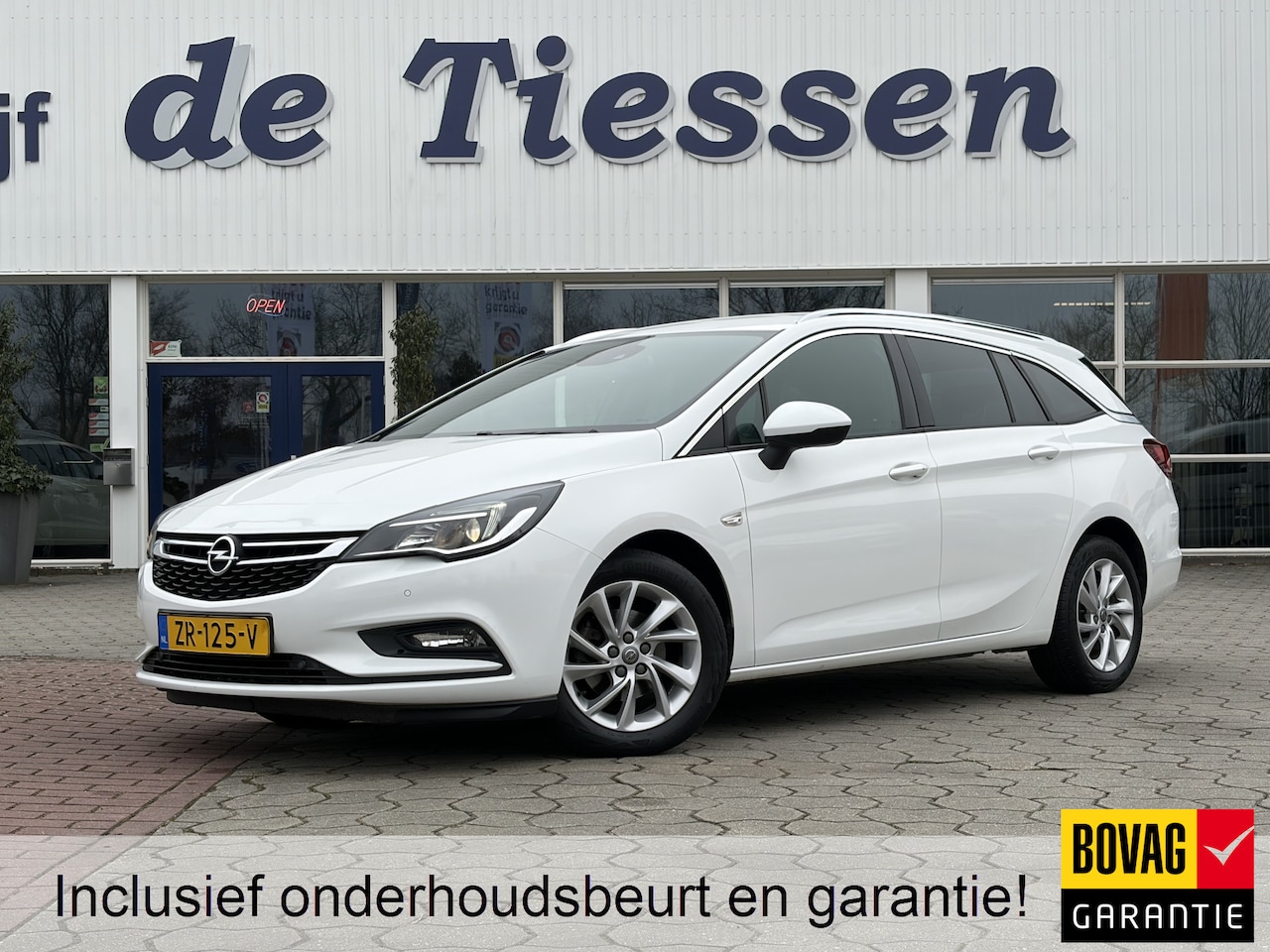 Opel Astra Sports Tourer - 1.4 Turbo Business Executive Automaat, Stoelvrw., Navi, Rijklaar met beurt & garantie! - AutoWereld.nl