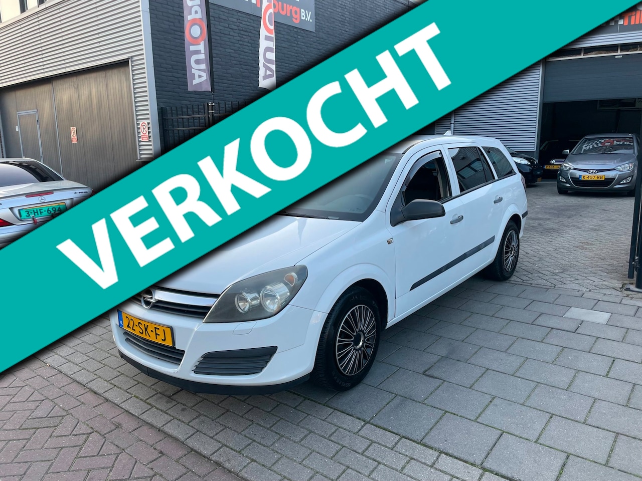 Opel Astra Wagon - 1.6 Business Automaat Airco Navi NAP APK - AutoWereld.nl