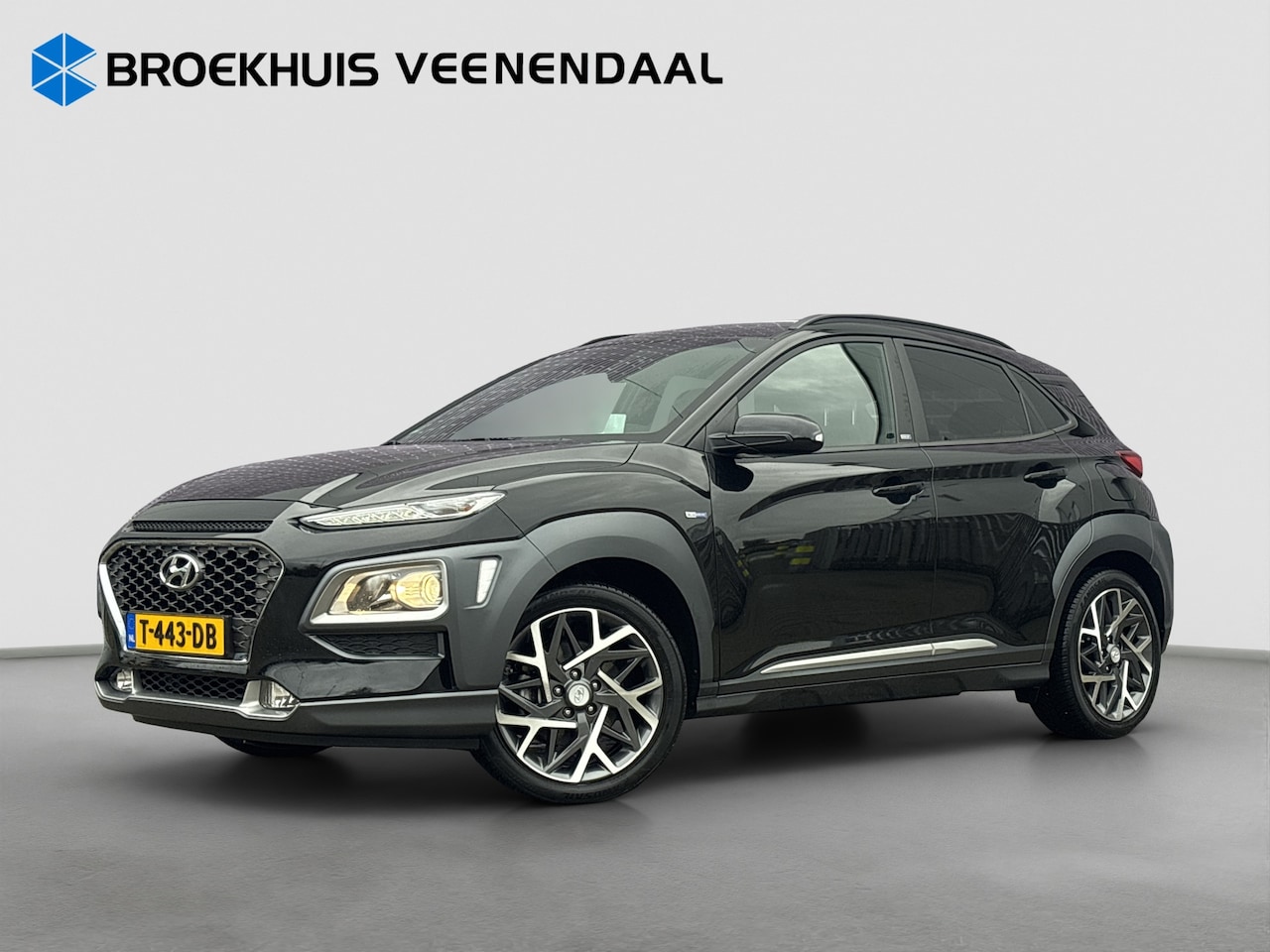 Hyundai Kona - 1.6 GDI HEV Premium | Leder | Trekhaak | HUD | BLIS | Navigatie | Achteruitrijcamera | Air - AutoWereld.nl