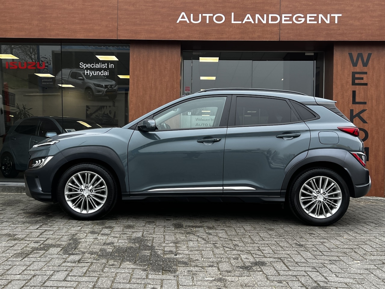 Hyundai Kona - 1.6 GDI HEV Premium Stoel/stuurverwarming PDC V+A Leder - AutoWereld.nl
