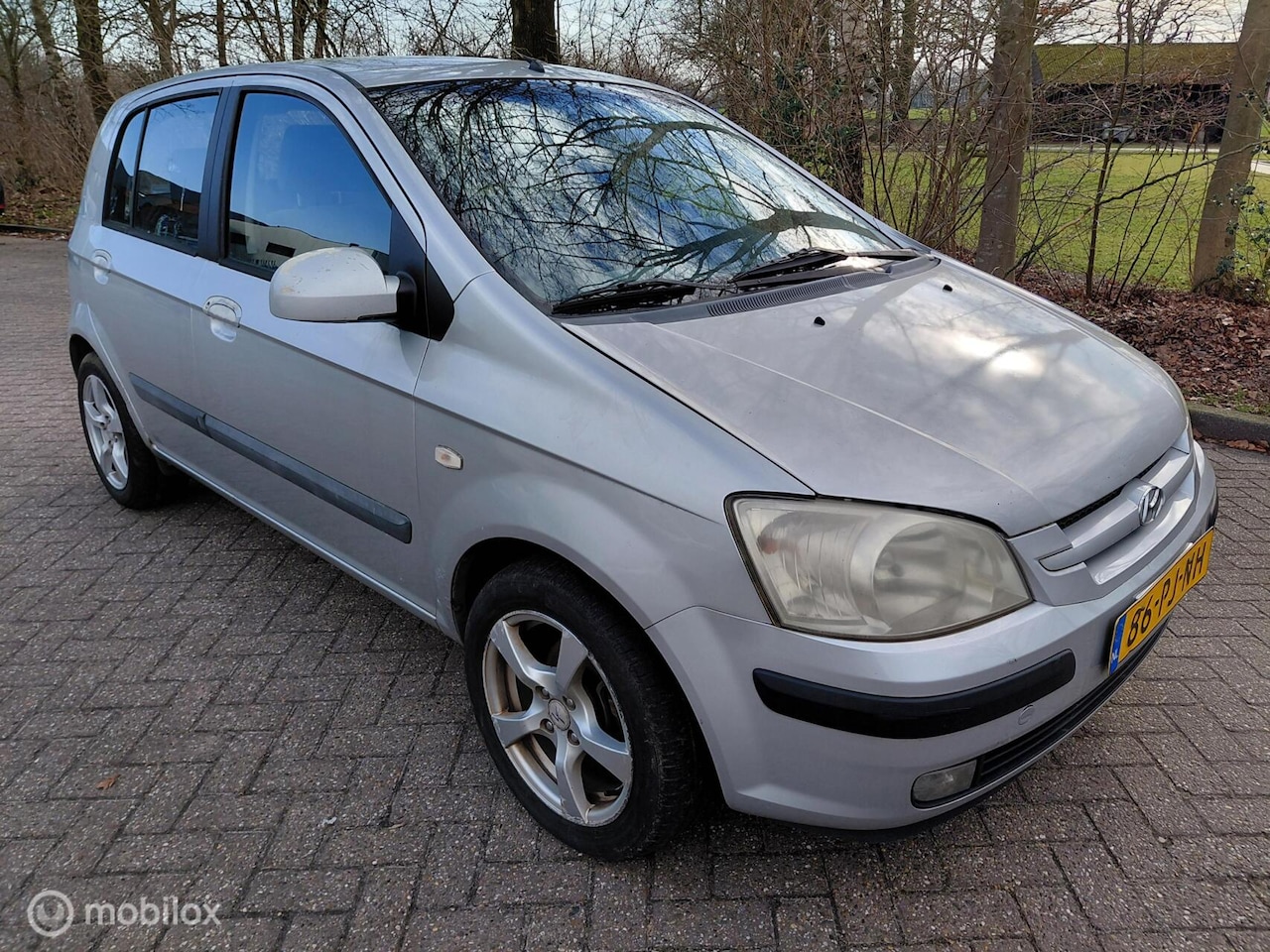 Hyundai Getz - 1.3i 60 KW 82 PK GLS Sky Airco KM 186852 NAP - AutoWereld.nl