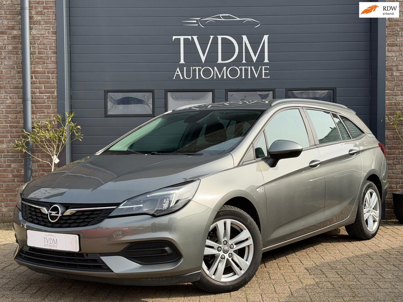 Opel Astra Sports Tourer - 1.2 Business Edition|NAVI|CARPLAY|AIRCO| - AutoWereld.nl