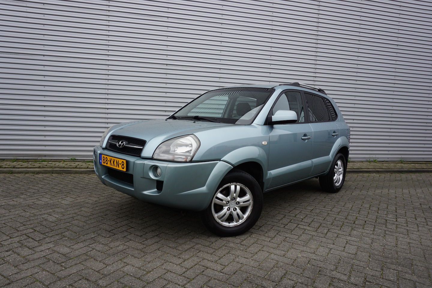 Hyundai Tucson - 2.0i Style Executive Climate / Navi / Cruise / Elektr. ramen / Parkeersens. / Trekhaak / N - AutoWereld.nl