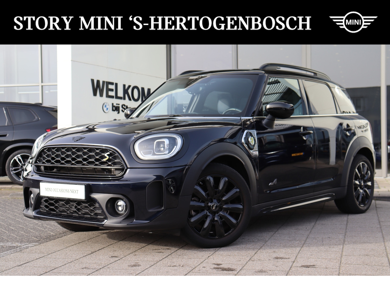 MINI Countryman - Cooper S E ALL4 Automaat / Panoramadak / Comfort Access / Achteruitrijcamera / LED / Cruis - AutoWereld.nl