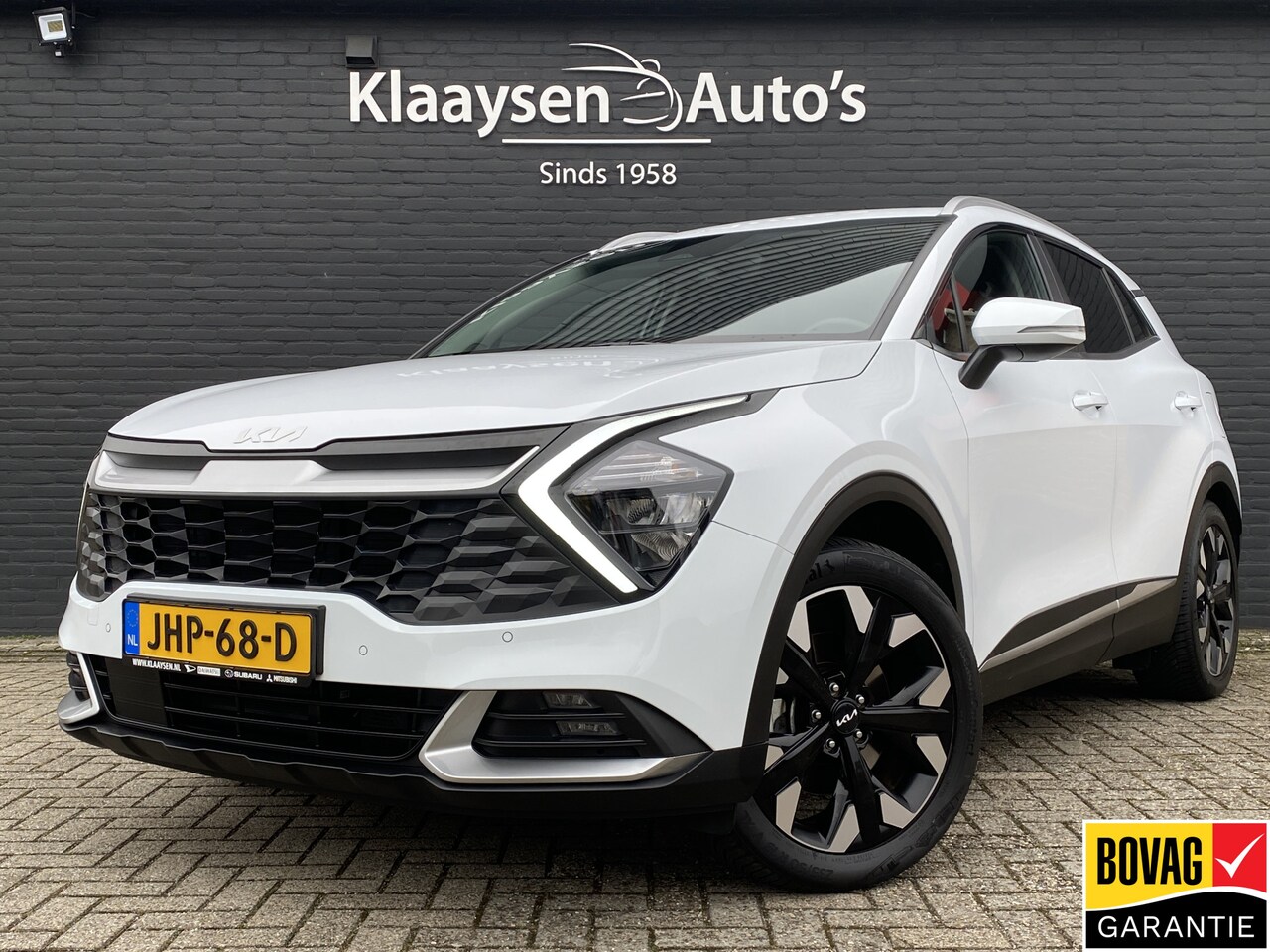 Kia Sportage - 1.6 T-GDi Plug-in Hybrid 265 pk AWD DynamicLine | dealer onderh. | trekhaak | navigatie | - AutoWereld.nl