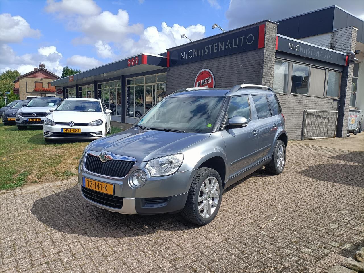 Skoda Yeti - 1.4 TSI Ambition Navigatie, Stoelverwarming - AutoWereld.nl