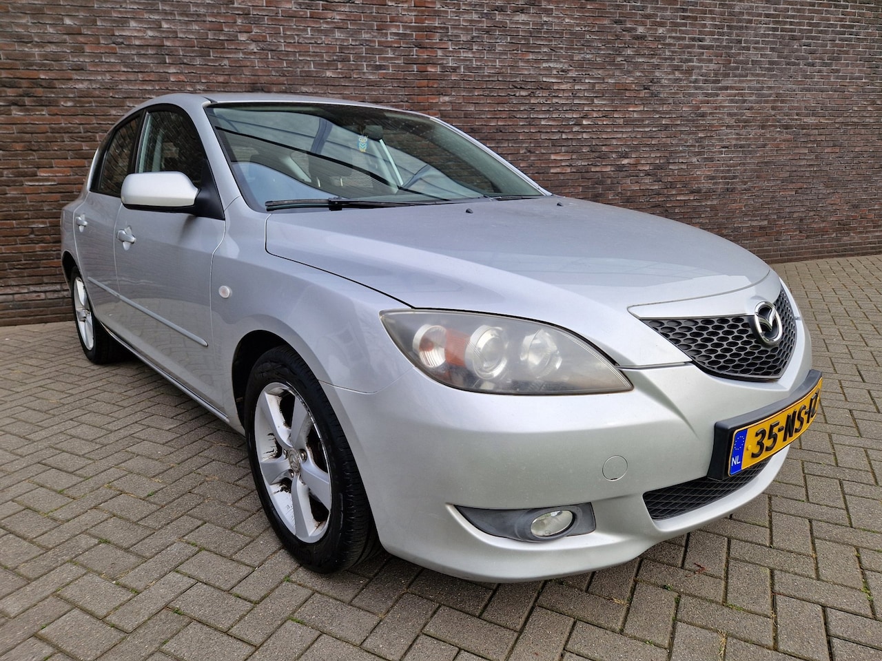 Mazda 3 Sport - 1.6 Touring airco cruise trekhaak APK 03-2027 - AutoWereld.nl