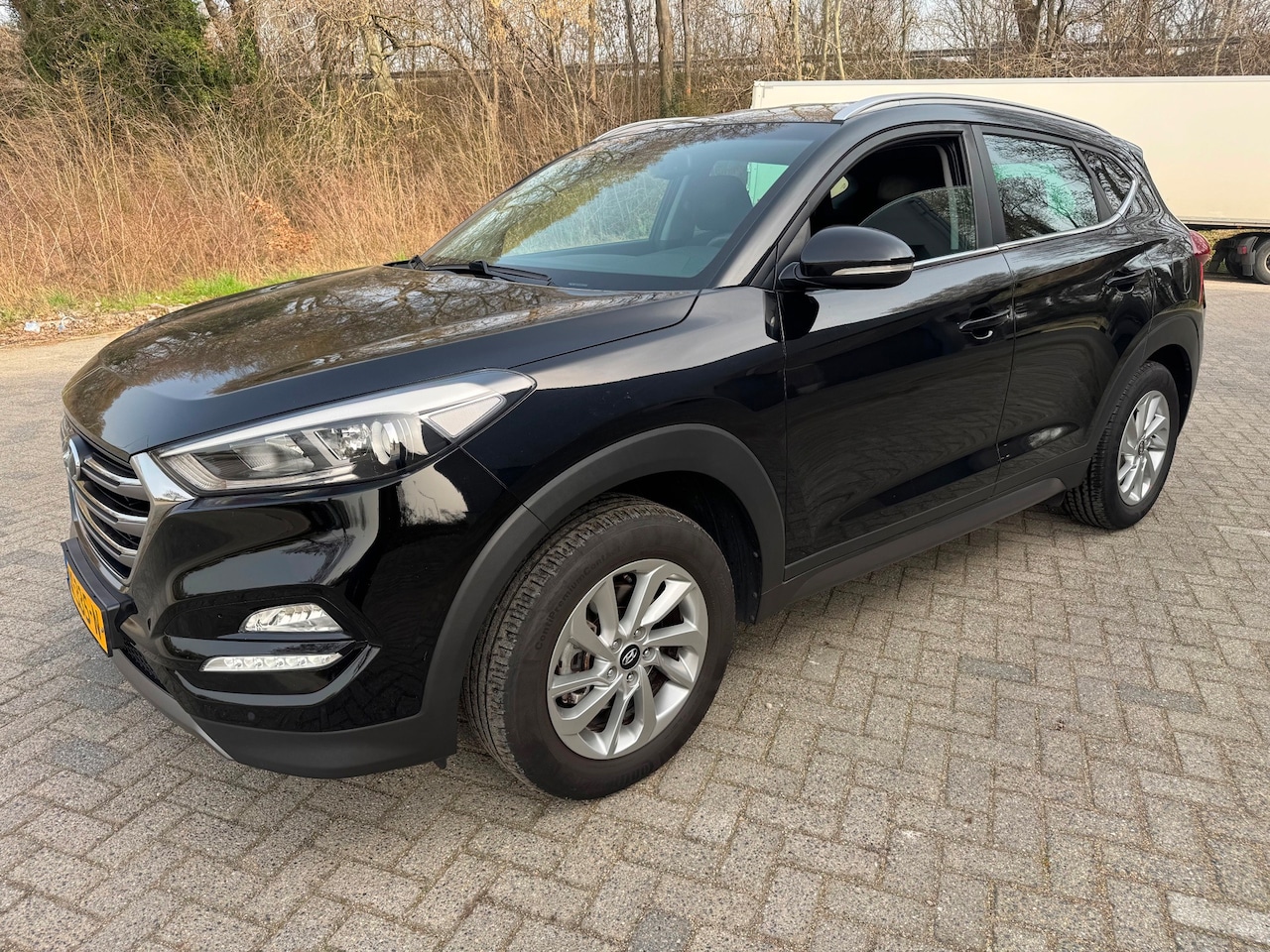 Hyundai Tucson - 1.6 GDi Comfort ParkA StoelV Navi LineA - AutoWereld.nl
