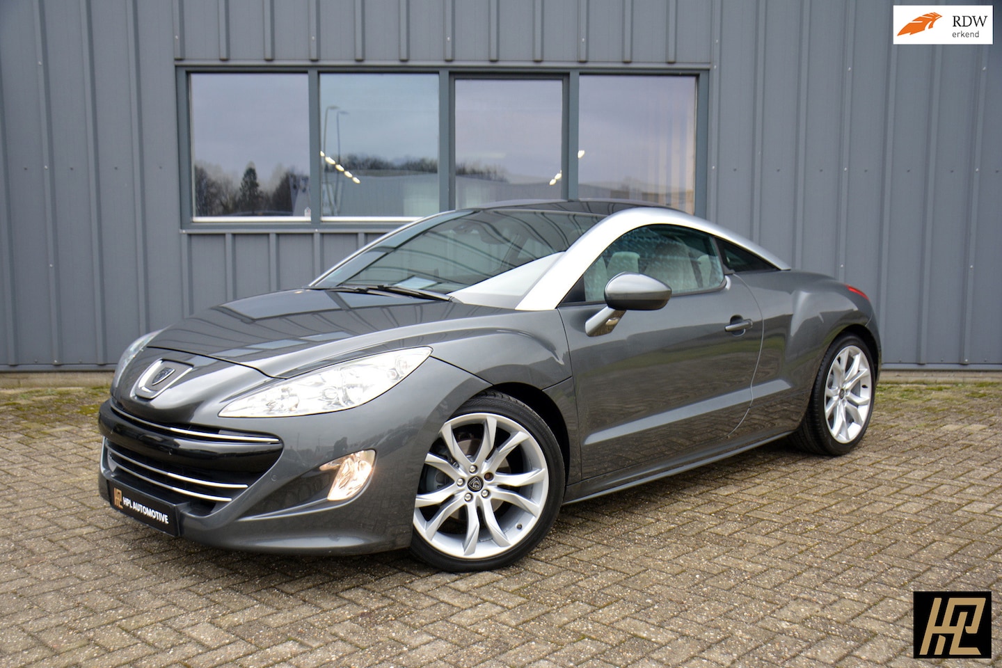 Peugeot RCZ - 1.6 THP 156pk * Leer * Navi * 19" * PDC * Aparte auto - AutoWereld.nl