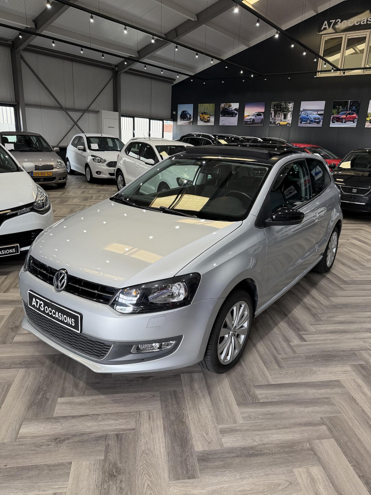 Volkswagen Polo - 1.2 Styl Pano,stoelverwarming,camera,styl - AutoWereld.nl