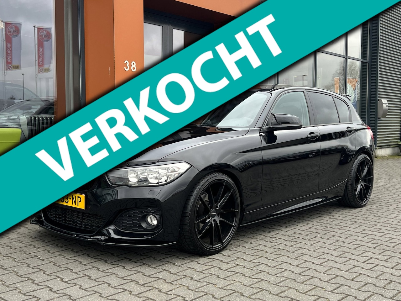 BMW 1-serie - 116i M140 LOOK|Navi|Cruise|PDC|Bluetooth|Stoelv. - AutoWereld.nl