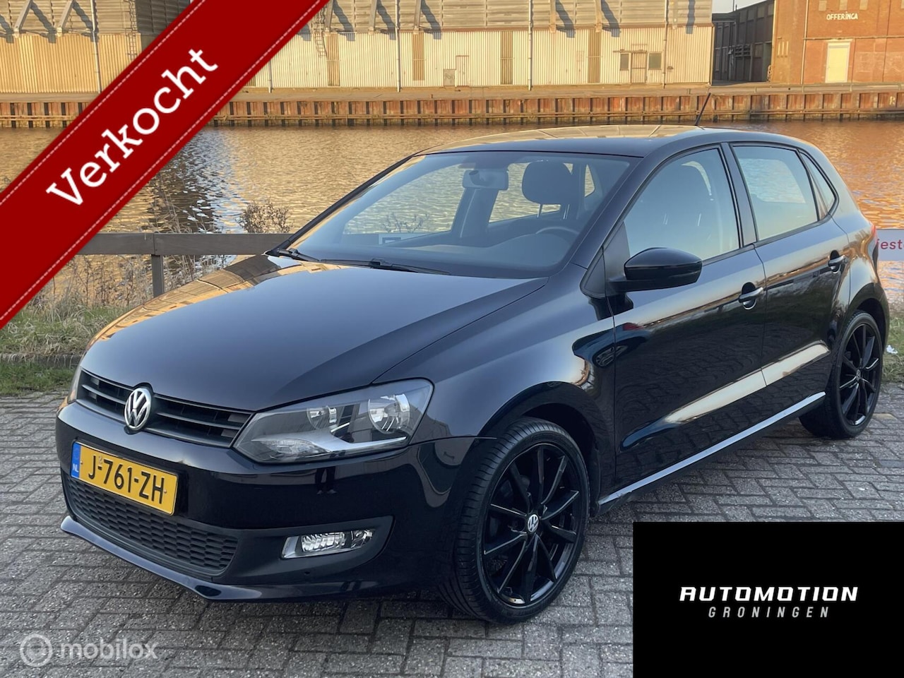 Volkswagen Polo - 1.2 5-Deurs Climate Navi LMV - AutoWereld.nl