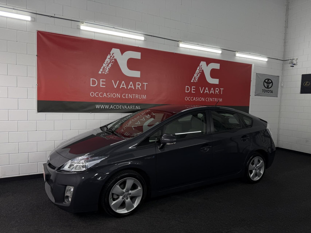 Toyota Prius - 1.8 Hybride Aspiration - NAVI/CLIMA/PDC/NAP - AutoWereld.nl