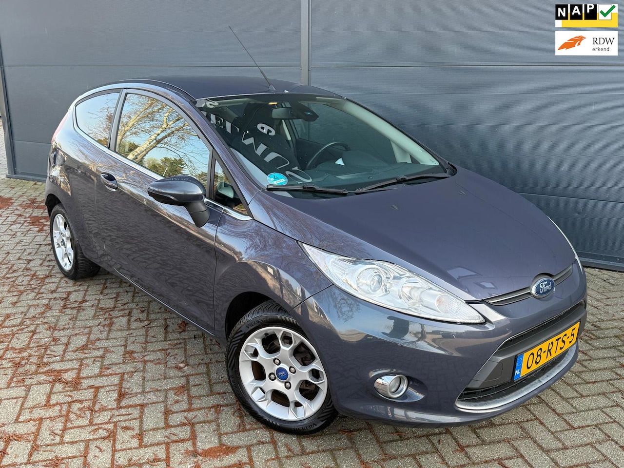 Ford Fiesta - 1.4 Titanium/Airco/cruise/parkeersensoren/nw apk - AutoWereld.nl