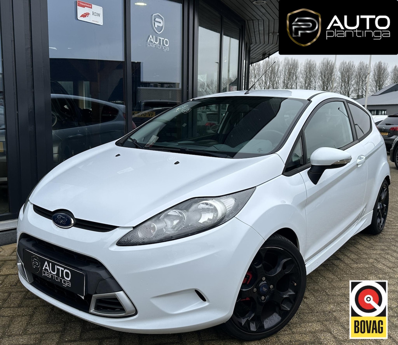 Ford Fiesta - 1.25 Limited | Zeer Nette Staat | Onderhoudshistorie | Airco | Grote Spoiler | 17 Inch Lic - AutoWereld.nl