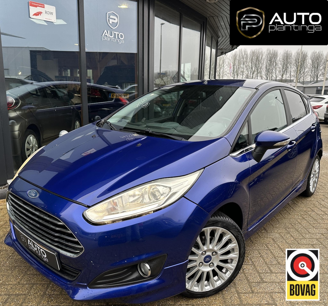 Ford Fiesta - 1.0 EcoBoost Titanium 125PK | Nette Staat | NL AUTO | Airco | Cruise Control | Voorruitver - AutoWereld.nl