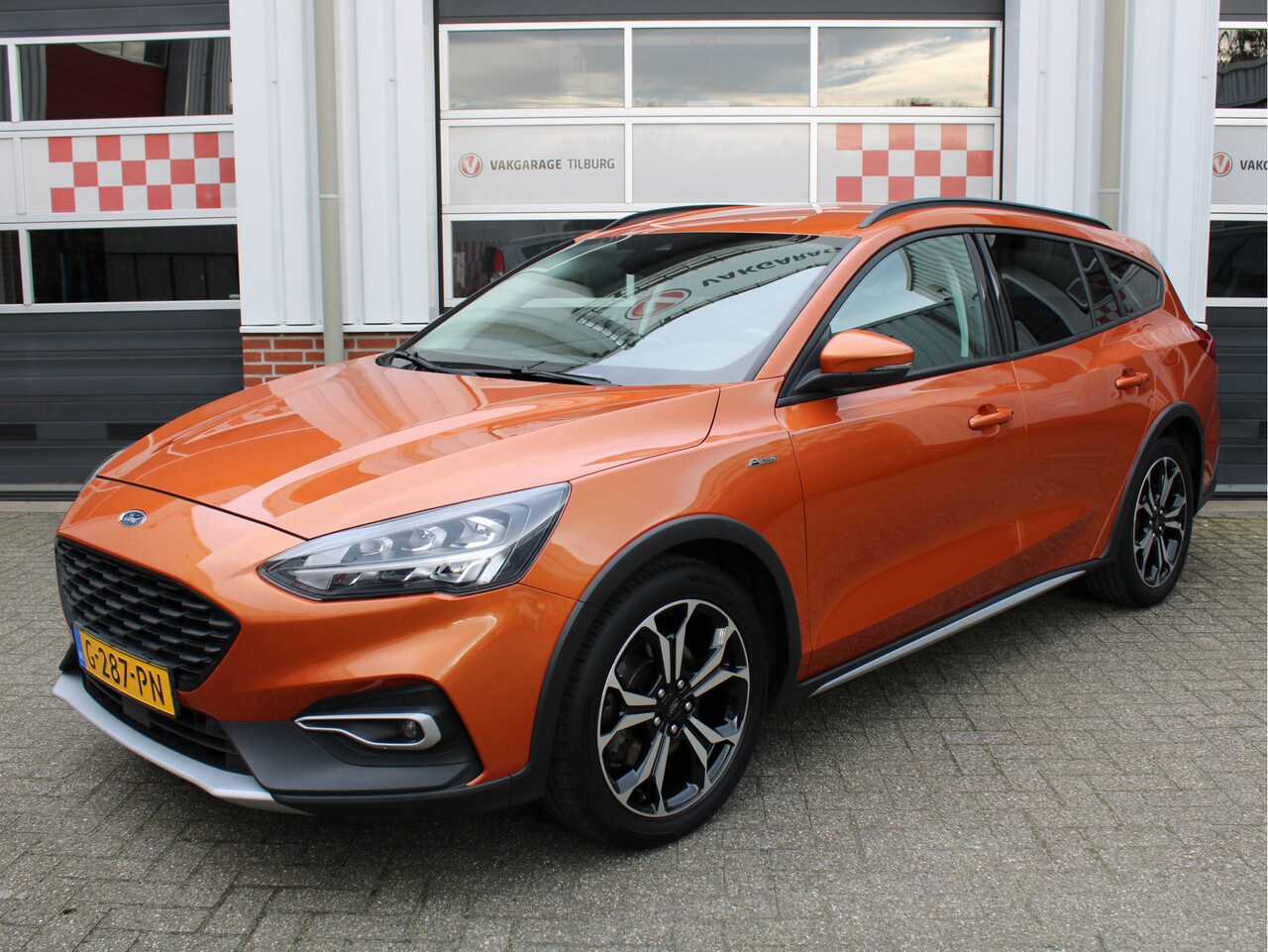 Ford Focus Wagon - 1.0 EcoBoost Active Business Dealer onderh./Winterpack/AGR/B&O/Cruise/Navi/Carplay/18inch/ - AutoWereld.nl